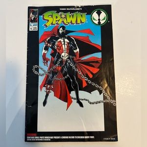 Todd McFarlane’s Spawn special edition comic book and cape